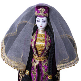 Кукла в осетинском национальном платье фиолетового цвета
