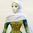 Кукла коллекционная в чеченском национальном платье зеленого цвета